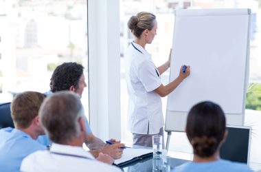 Team of doctors having brainstorming session in the meeting room Team of doctors having brainstorming session in the meeting room